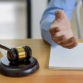 Who pays the settlement fee?